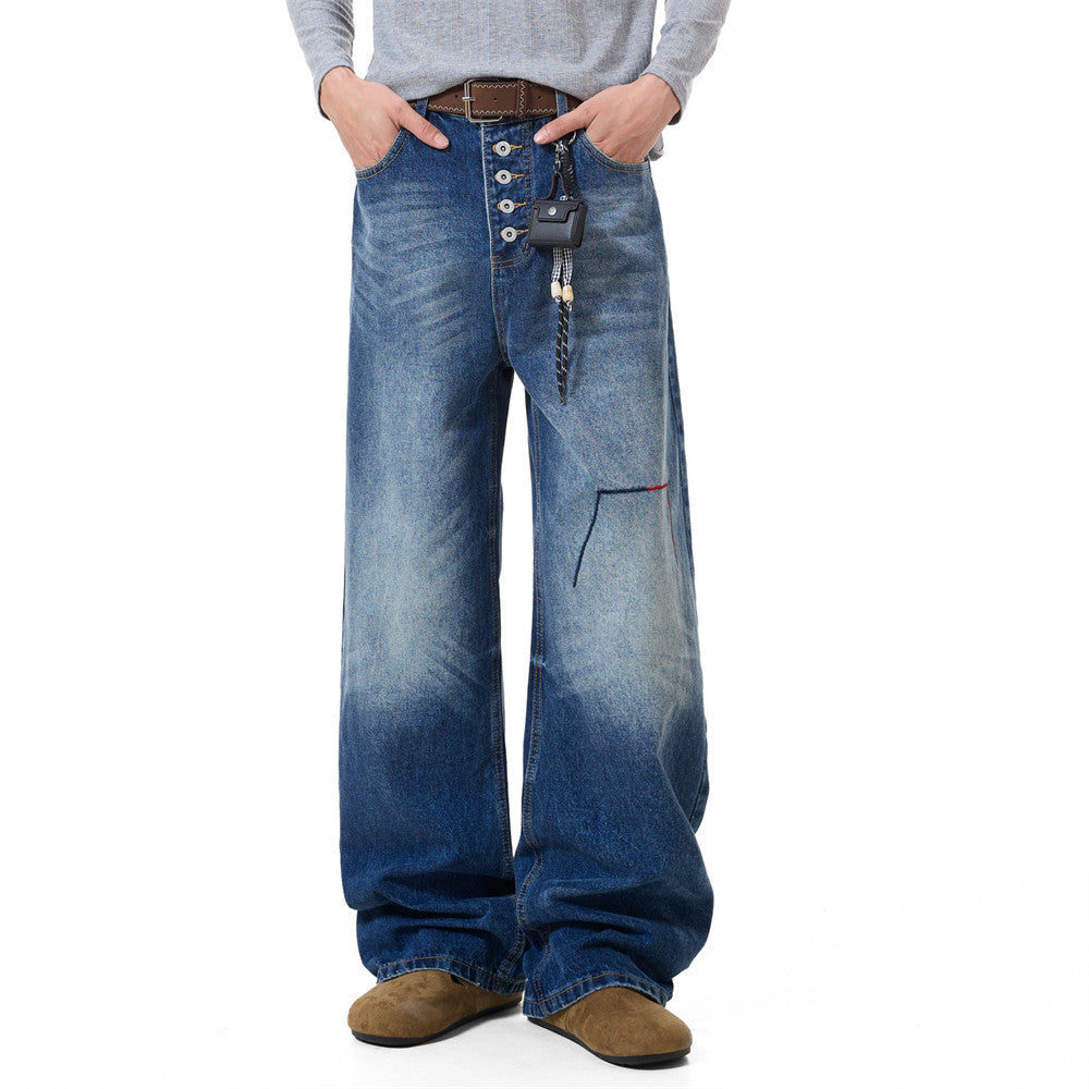 Baggy-Jeans für Herren mit weitem Bein in verwaschenem Dunkelblau, Knopfleiste und Stickdetail am Oberschenkel, Vorder- und Rückansicht