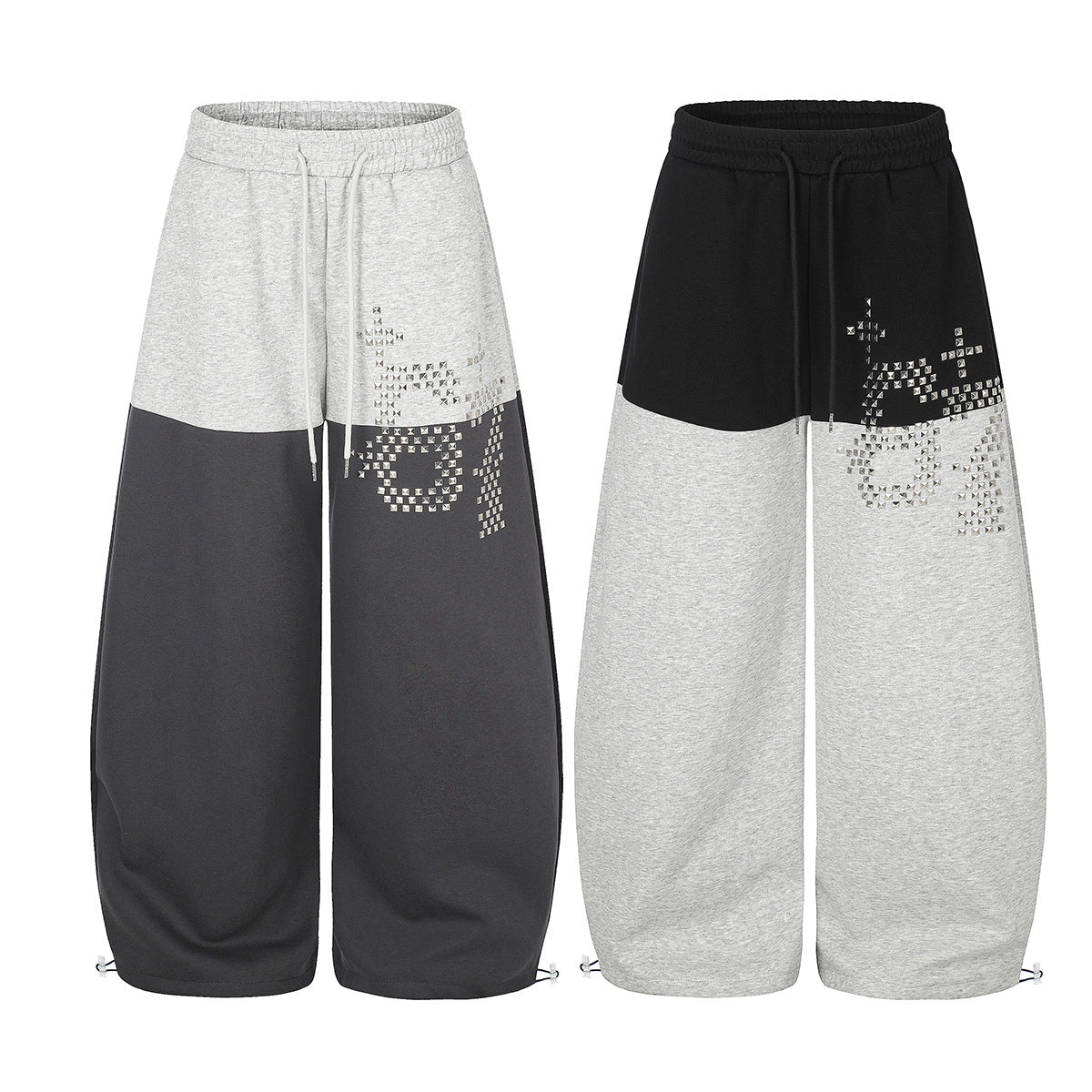 Gerade geschnittene Sweatpants – Colorblock-Baggy-Jogger mit Nieten-Grafik