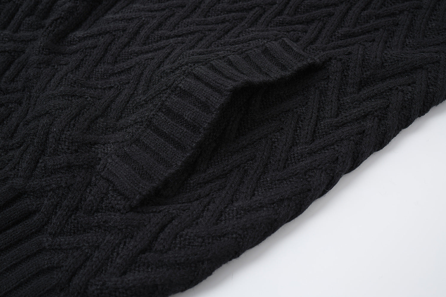 Cardigan en maille torsadée chevrons avec col châle et poches avant