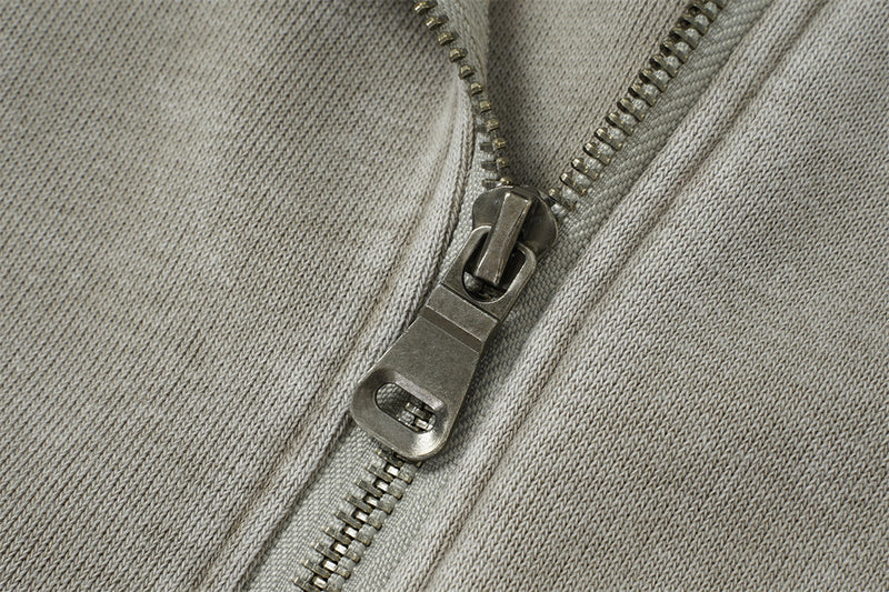 Sweat à capuche zippé homme délavé à l’acide, avec zip diagonal et empiècements déconstruits