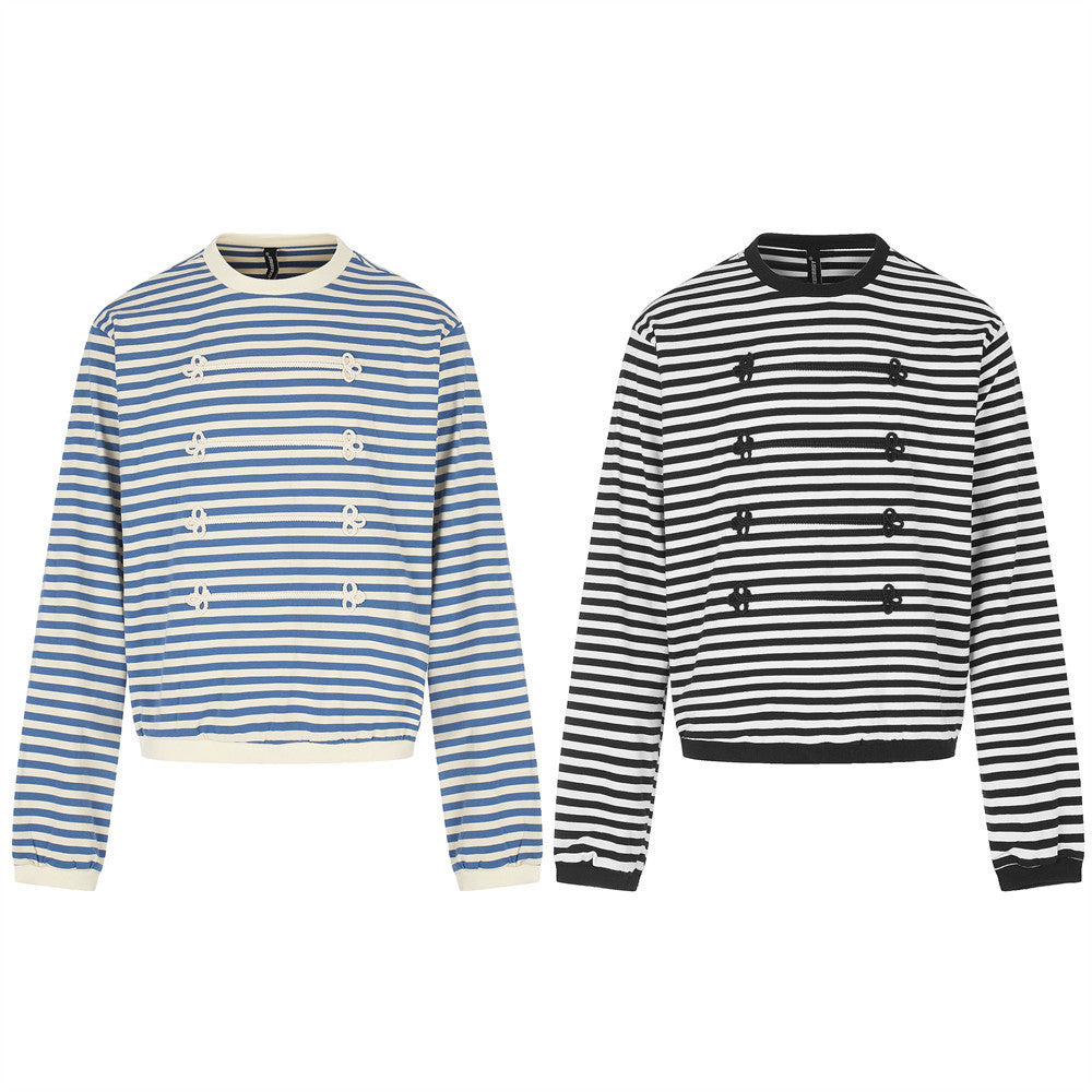 Black and white striped long sleeve shirt with contrast trim and floral knit front details