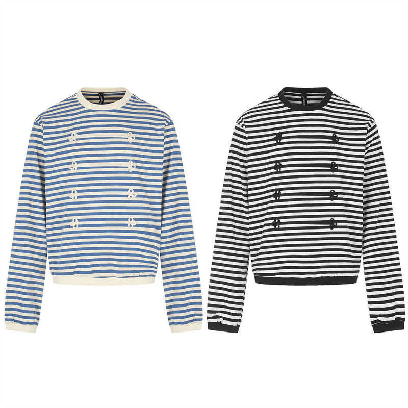 Black and white striped long sleeve shirt with contrast trim and floral knit front details