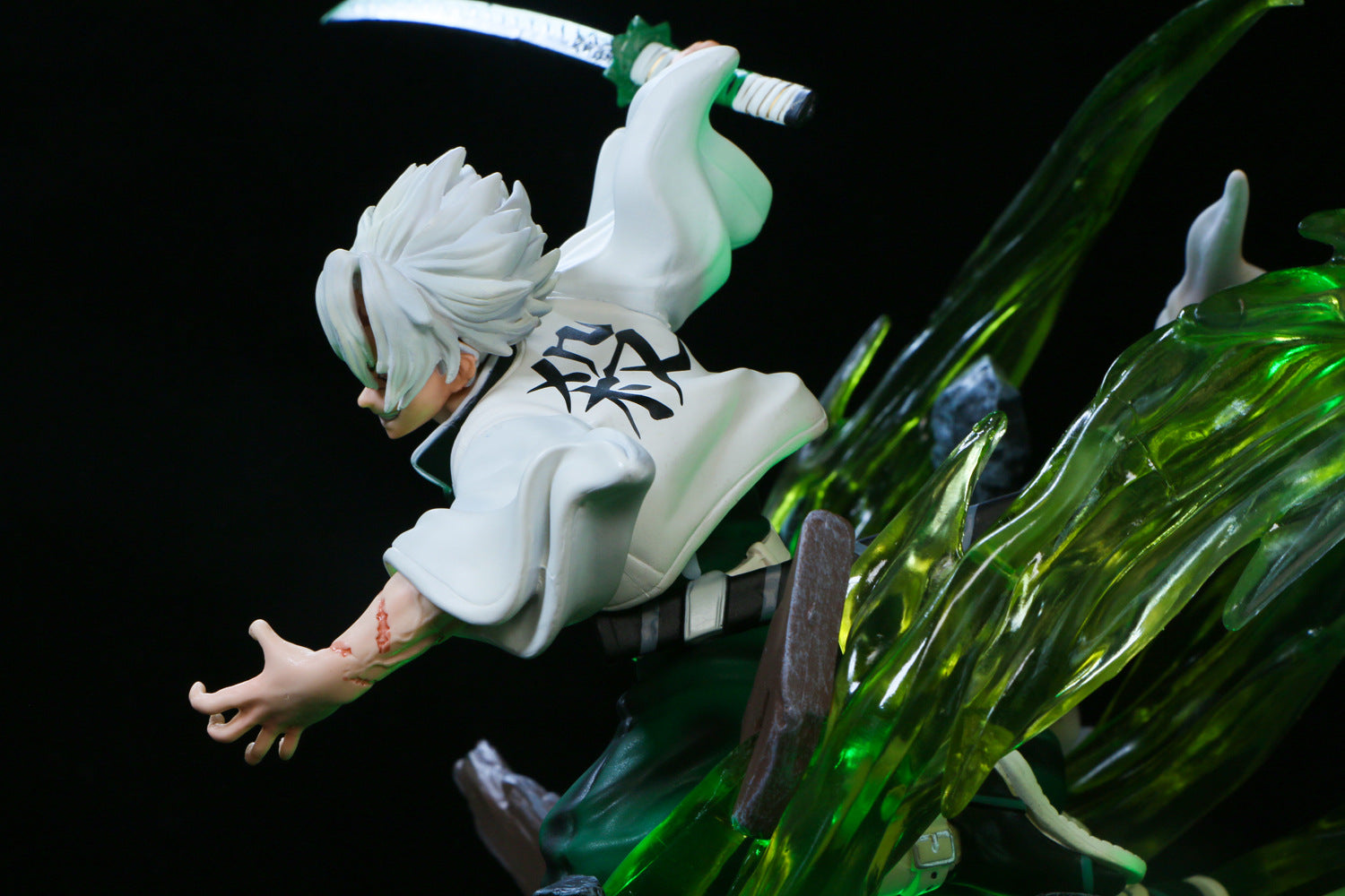 The Premium Demon Slayer Kaze Hashira Sanemi Shinazugawa Figure (30cm GK Model) showcases the Wind Hashira leaping through green energy with white hair and a robe featuring a black emblem, enhanced by USB light-up effects.