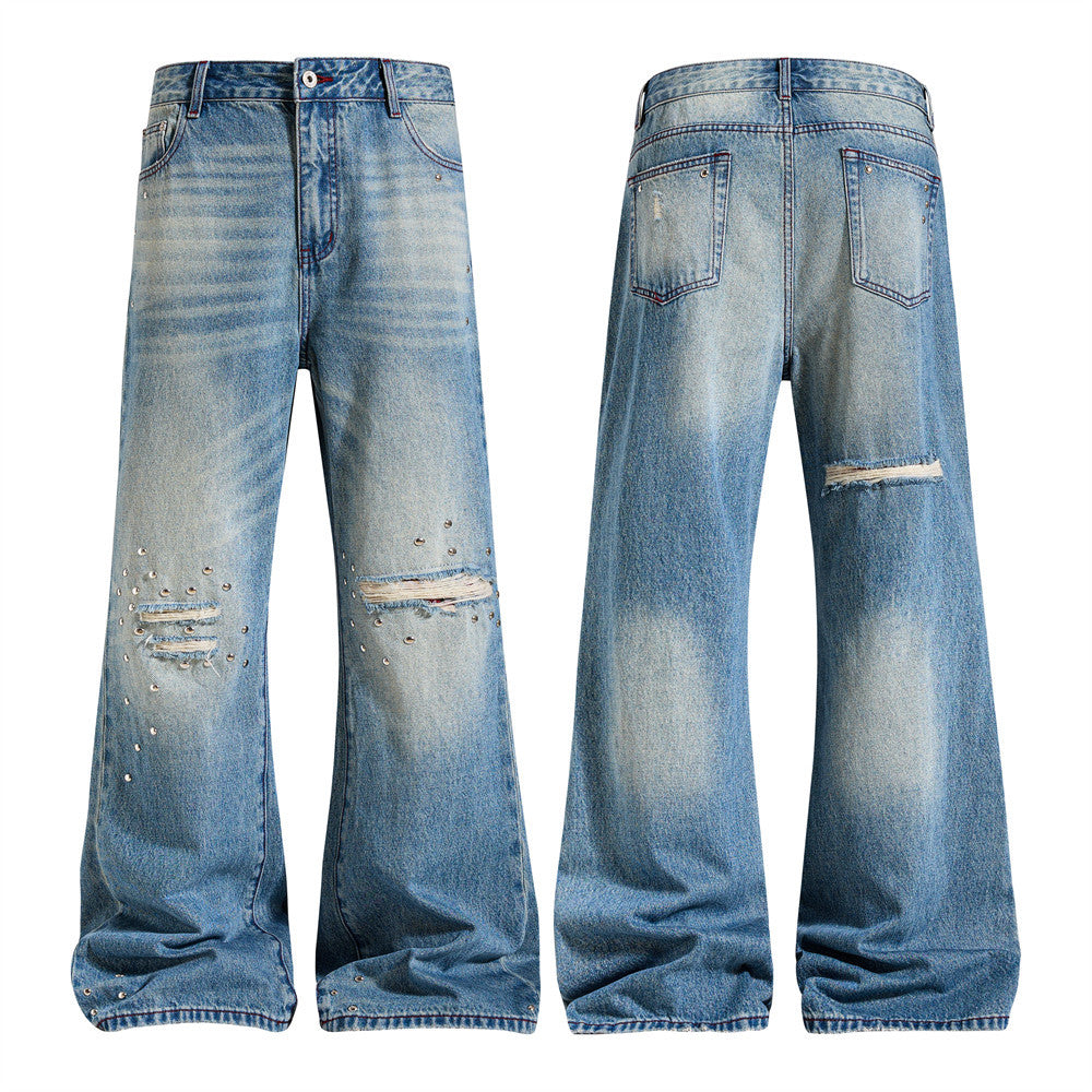 Men's washed blue wide-leg flare jeans with knee distressing and silver stud details, front and back view