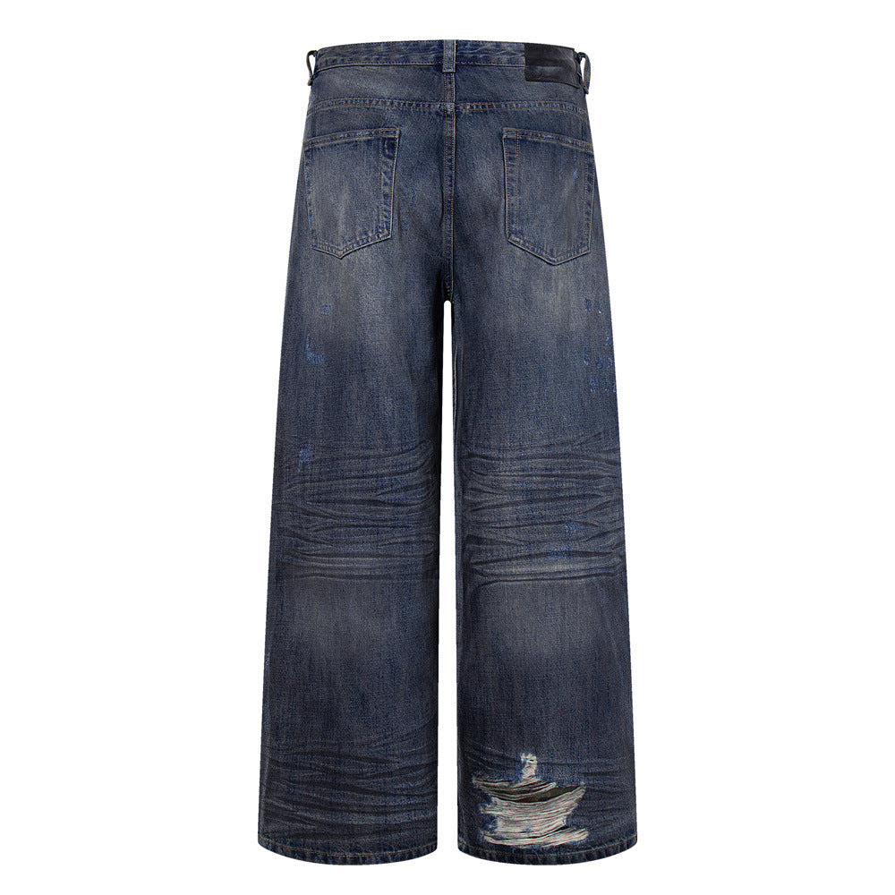 Wide-Leg Ripped Jeans – Vintage Washed Distressed Denim with Studded Patches
