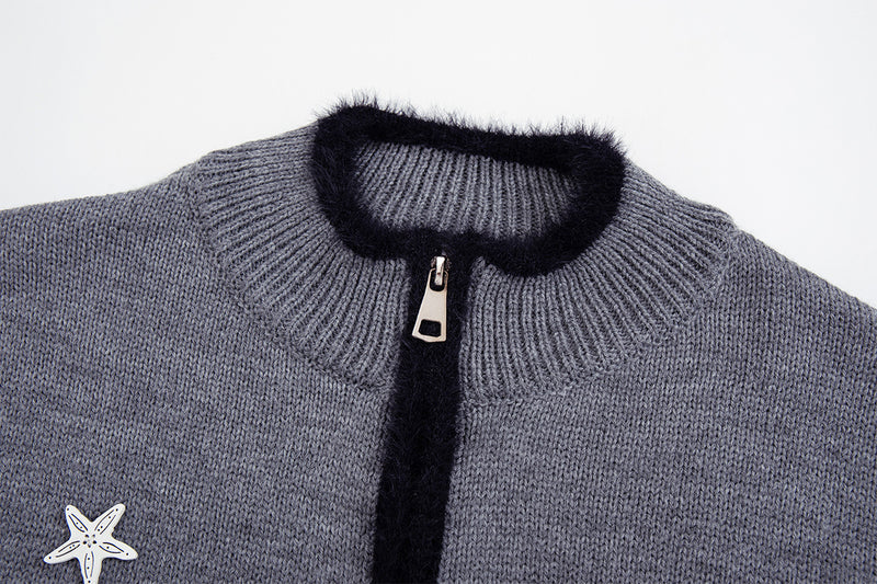 Gilet en maille zippé avec ornements cœur et étoile