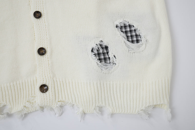 Cardigan en maille déstructurée à col tartan superposé