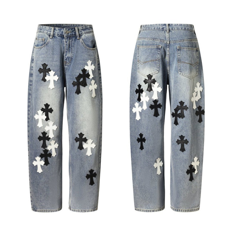 Light wash baggy jeans with black and white cross patches, front and back flat lays