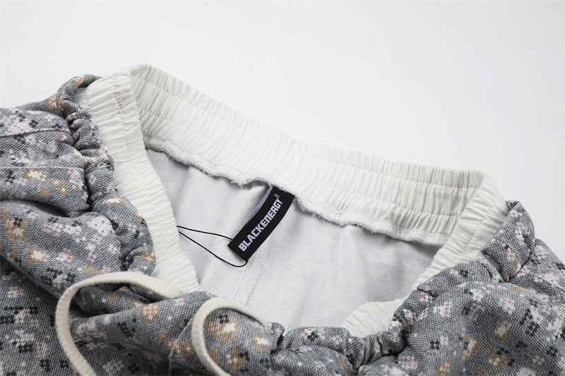 Inside waistband close-up showing care label and cream elastic trim