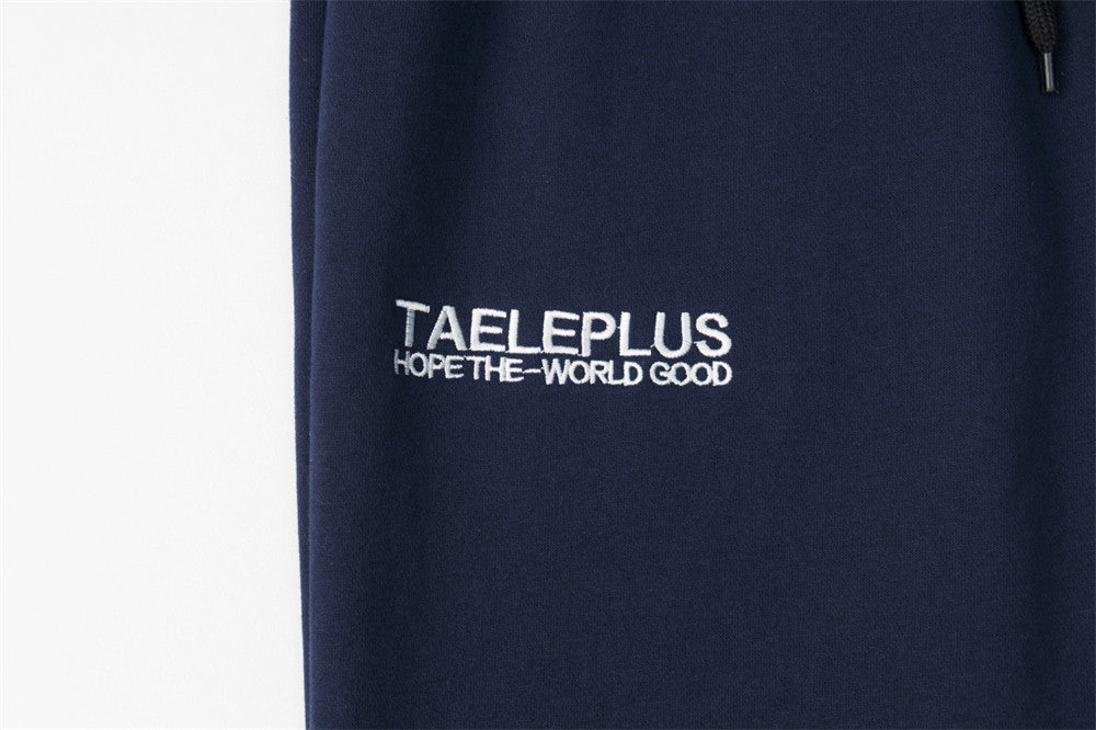 Pantalon de survêtement homme à jambes larges avec écusson brodé et imprimé graphique en écriture