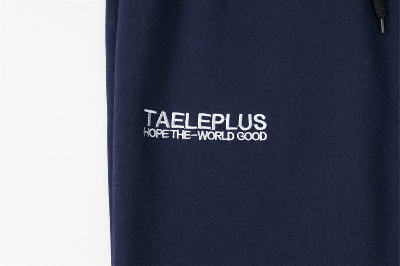 Pantalon de survêtement homme à jambes larges avec écusson brodé et imprimé graphique en écriture