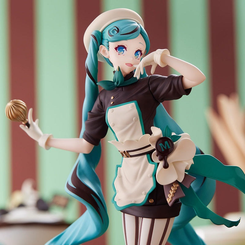 The Hatsune Miku Black Chocolate Pastry Chef 21cm PVC Figure showcases Miku with turquoise hair in a black and white chef outfit, featuring a large bow and whisk, set against green and white stripes. This anime-style collectible is a must-have for fans.