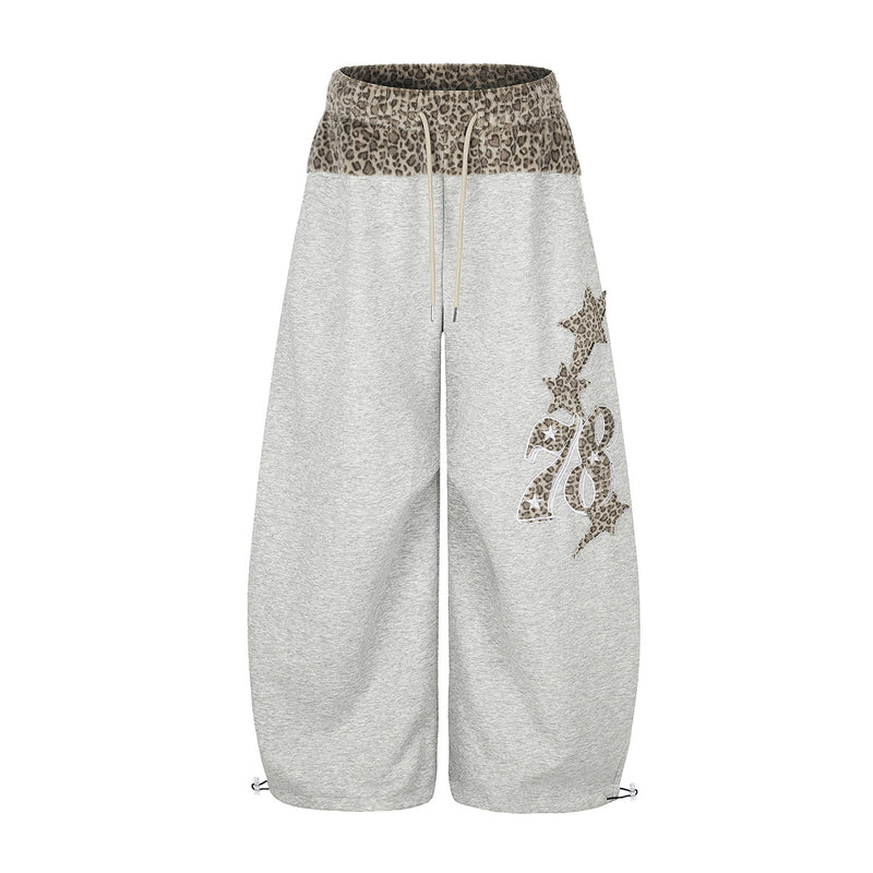 Baggy-Sweatpants mit Leopardenbund und Stern-Applikation