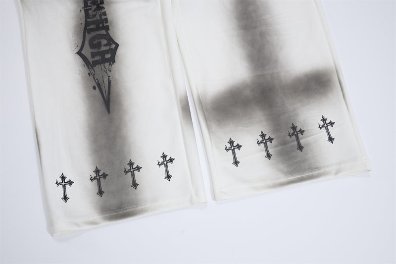 Pantalon de survêtement à jambes larges avec croix gothique et finition délavée