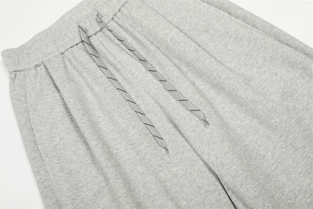 Pantalon de survêtement homme à jambes larges – Coupe ample, taille élastique, coloris uni