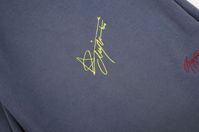 Pantalon de survêtement à jambes larges avec broderies graffiti signature et numéro 26