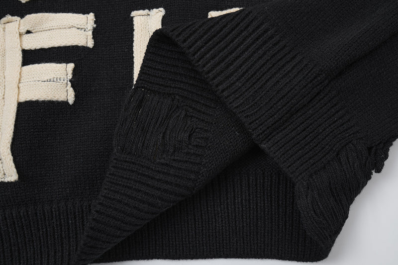 Pull col rond oversize en maille usée avec motif de lettres appliquées