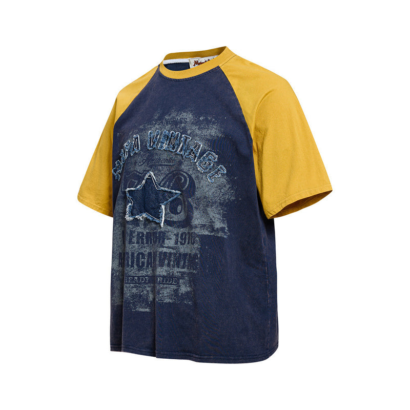 Vintage colorblock raglan T-shirt with mustard sleeves, navy body, and distressed star patch graphic