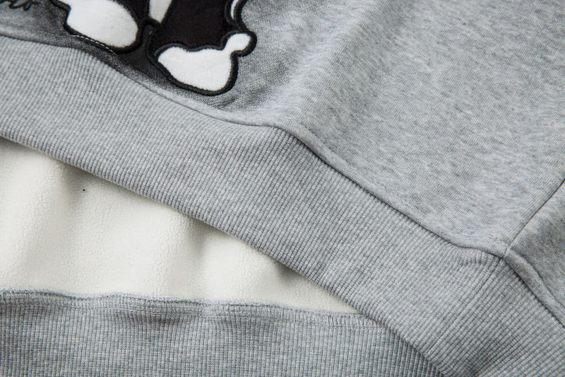 Sweat-shirt motif chat en smoking avec imprimé note de musique et manches raglan color block