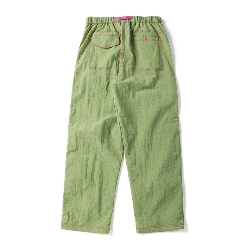 Back view of light green crinkled parachute pants with two outlined rear pockets