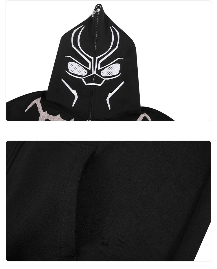 The Seakoff Black Panther-Inspired Hoodie features a stylized mask on the hood and ear design. This 400GSM oversized zip-up sweatshirt appears soft and smooth in photos, highlighting its hood and sleeve, making it ideal for streetwear enthusiasts.