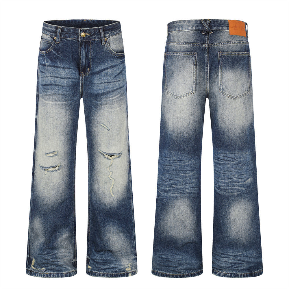 Men's wide leg distressed jeans in vintage blue wash with knee rips and faded gradient, front and back view