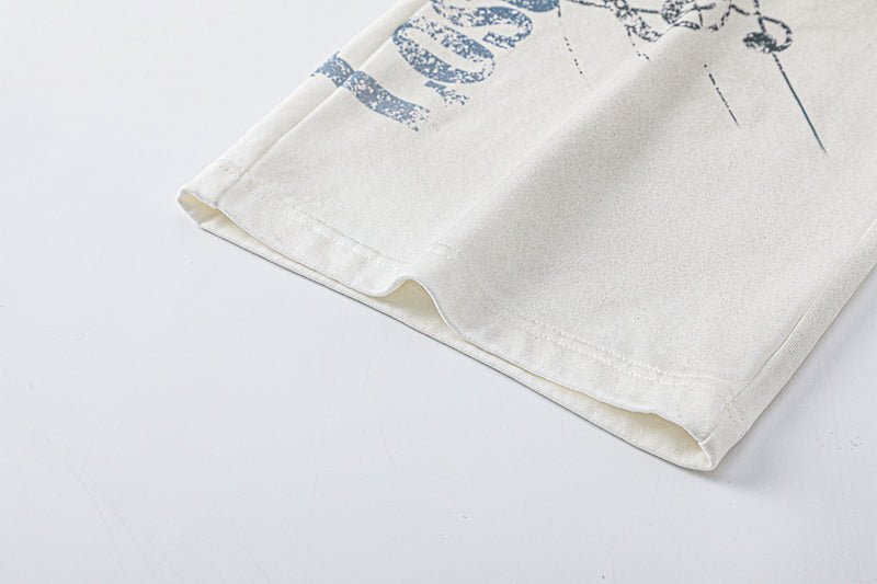 Pantalon de survêtement à jambes larges avec motif de notes de musique, coupe décontractée délavée