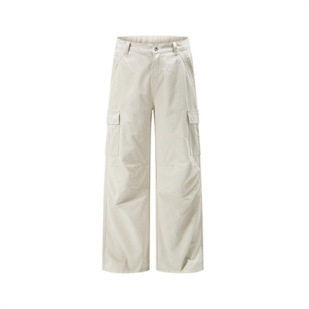 Cream wide-leg cargo pants with side flap pockets, front view