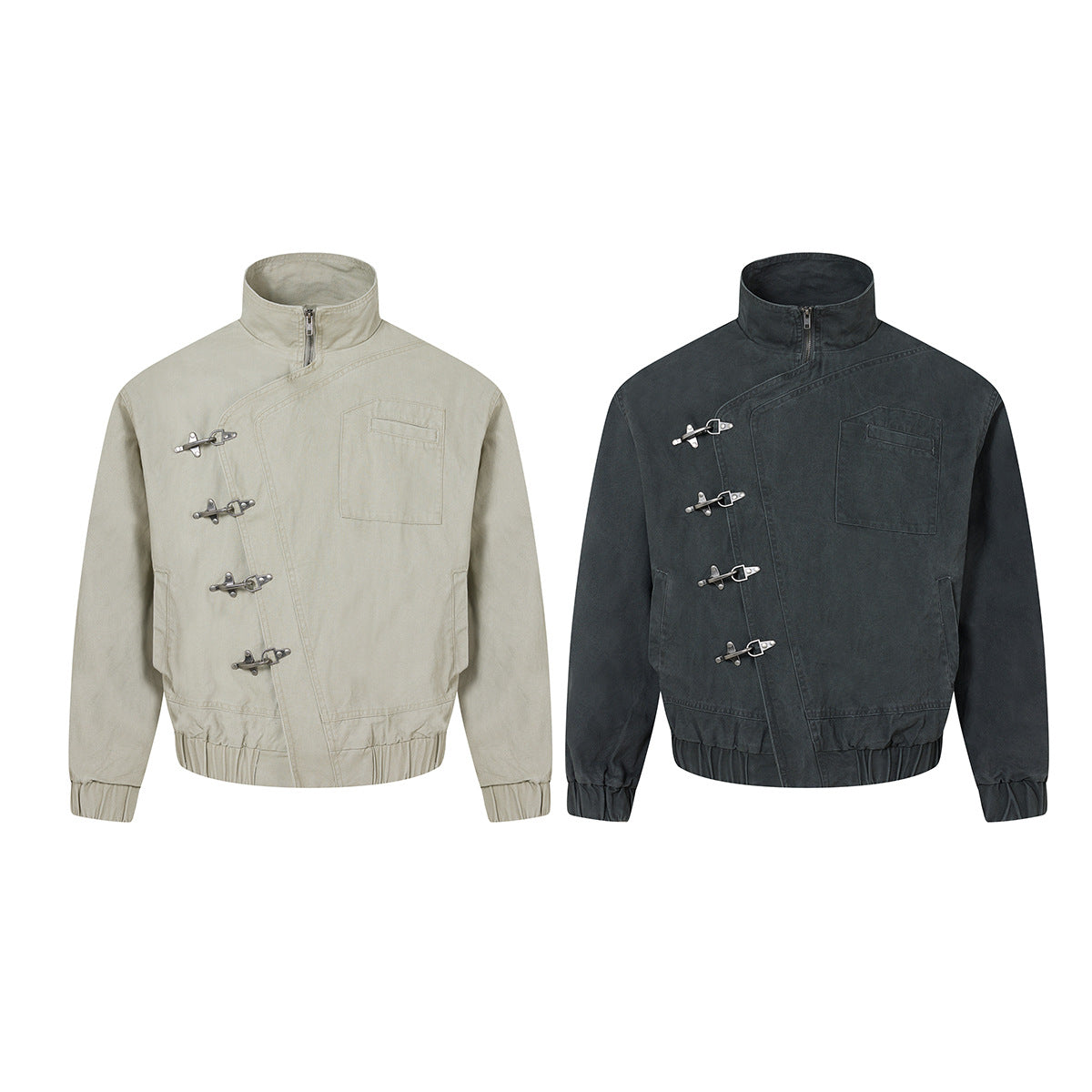 Oversized washed cotton bomber jacket with diagonal silver metal clasp buckles and mock-neck half-zip, shown in charcoal