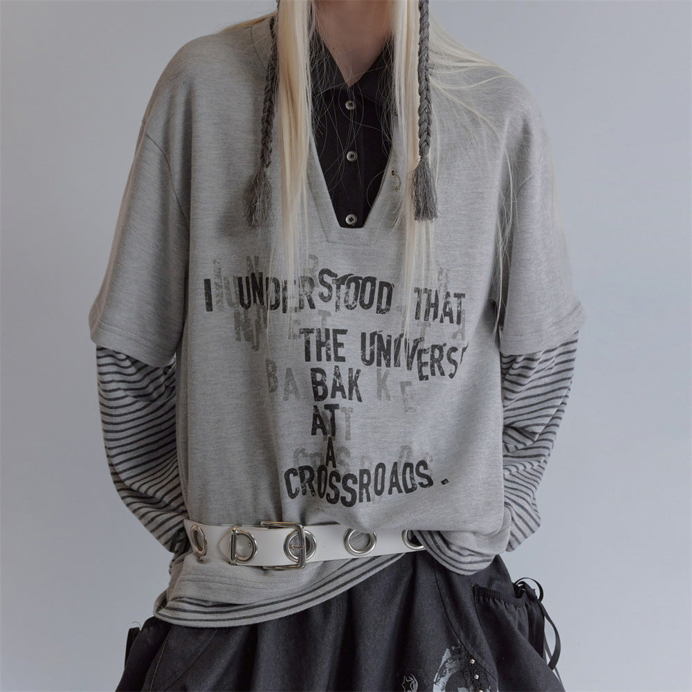 Oversized heather grey faux two-piece polo sweatshirt with striped long sleeves and distressed letter graphic print on chest