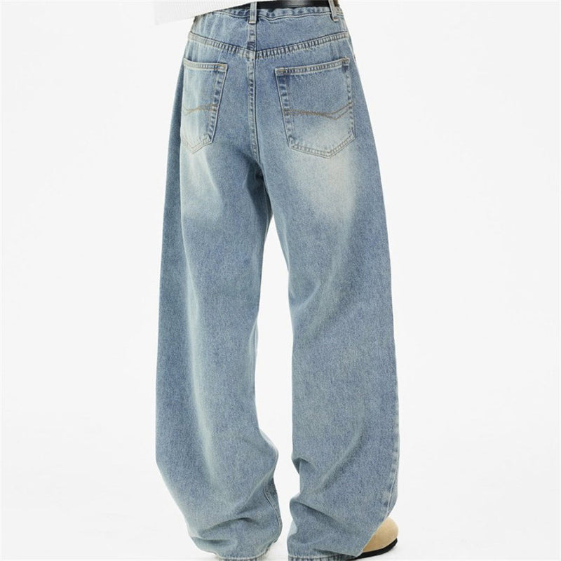 Back view of light blue wide-leg jeans with faded wash and two back pockets