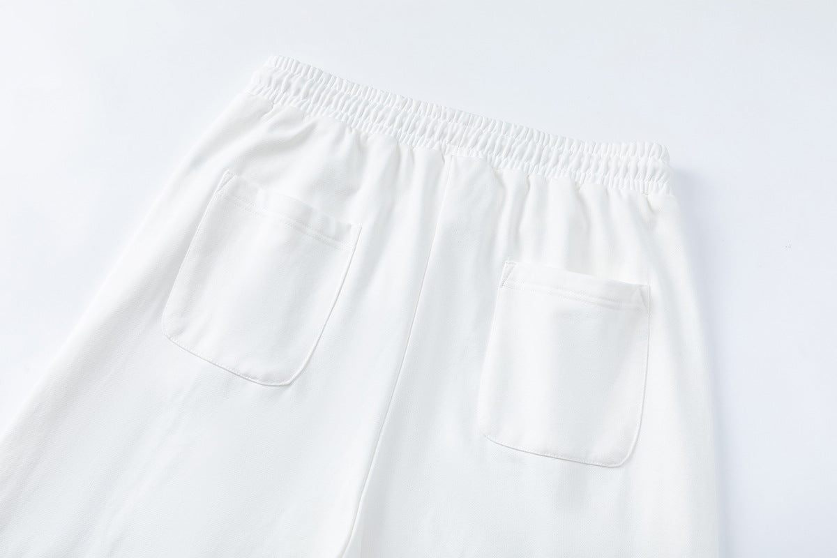 Pantalon de survêtement wide leg avec écusson varsity et motif graphique numéro 28