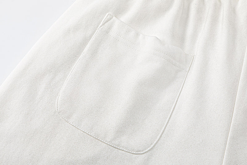 Pantalon de survêtement à jambes larges avec motif de notes de musique, coupe décontractée délavée
