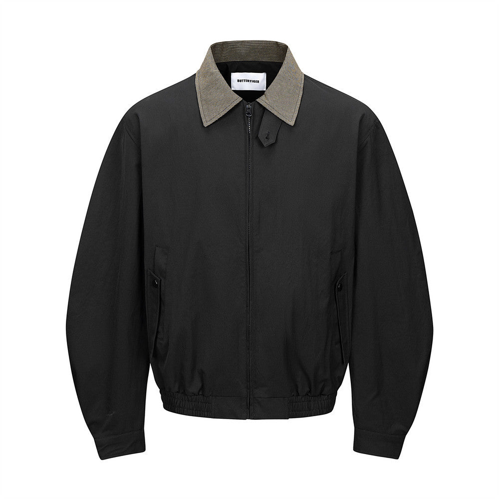 Men's black bomber jacket with houndstooth collar and pleated sleeves, front view