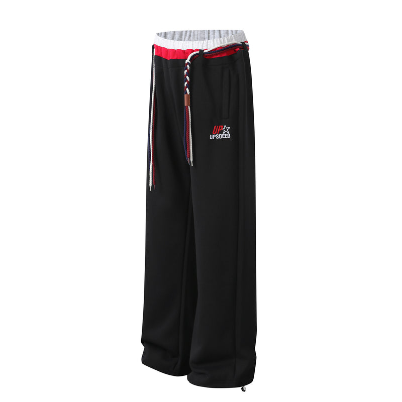 Pantalon de survêtement à jambes larges avec double ceinture et cordon tressé