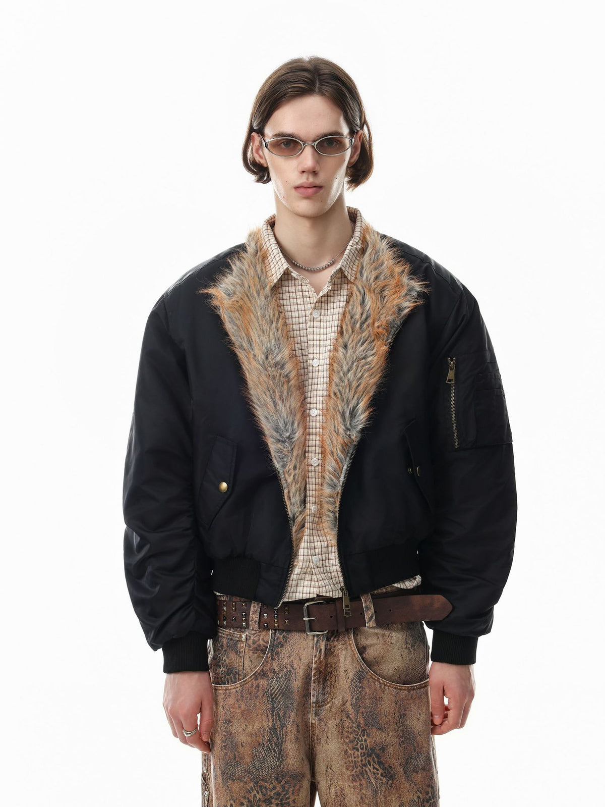 Oversized faux fur collar bomber jacket with quilted lining in black, worn open over a plaid shirt
