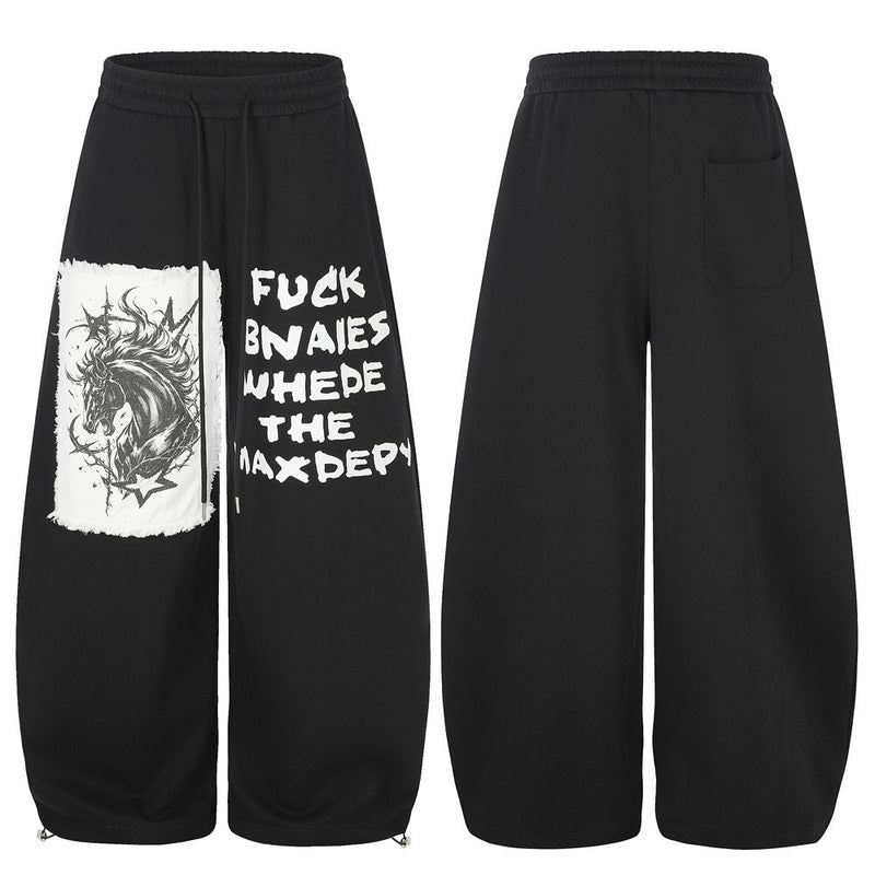 Pantalon de survêtement homme à jambes larges, motif graphique – Écusson licorne et slogan imprimé noir