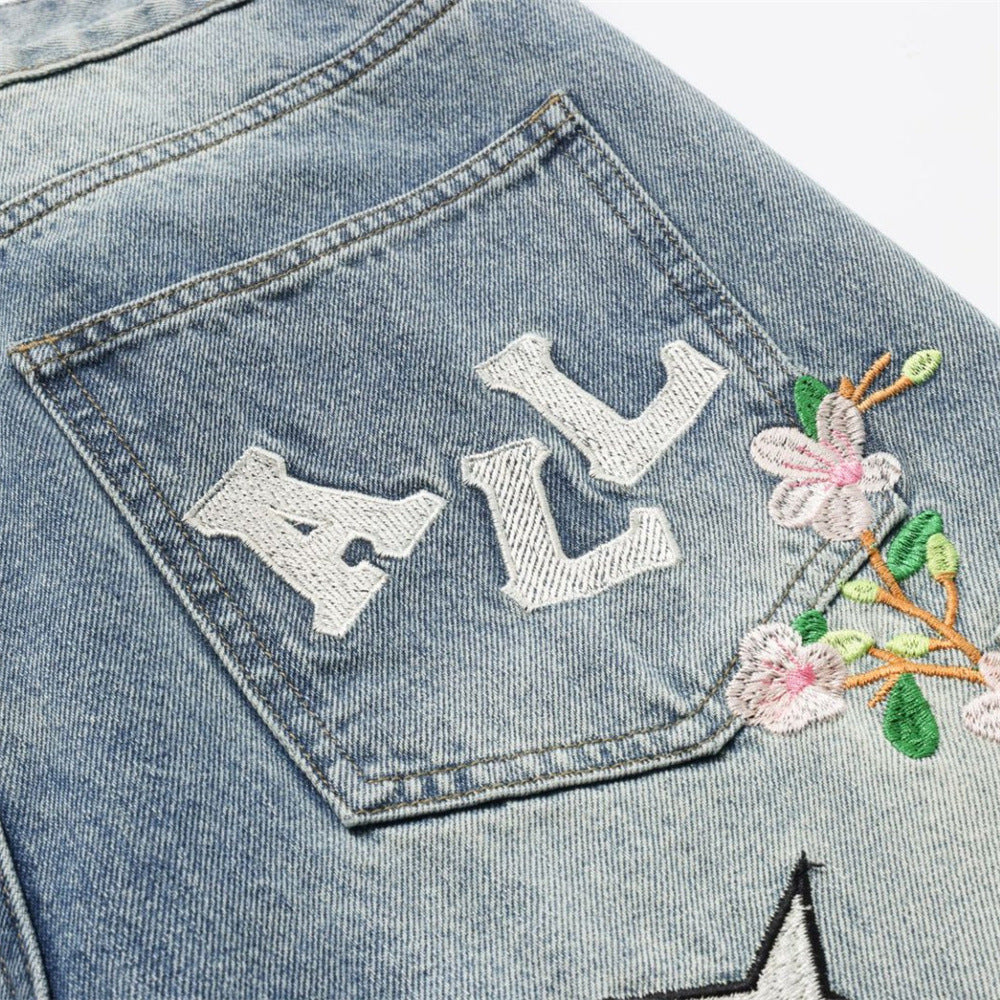 Vaqueros baggy de pierna ancha con flores bordadas, mariposas y motivos de patchwork