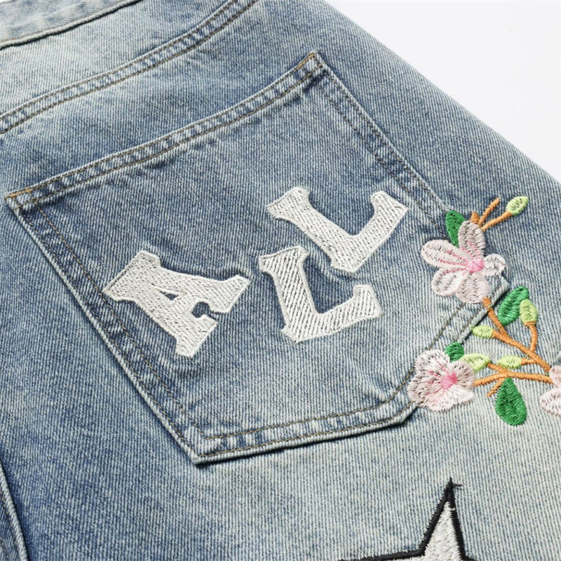 Vaqueros baggy de pierna ancha con flores bordadas, mariposas y motivos de patchwork