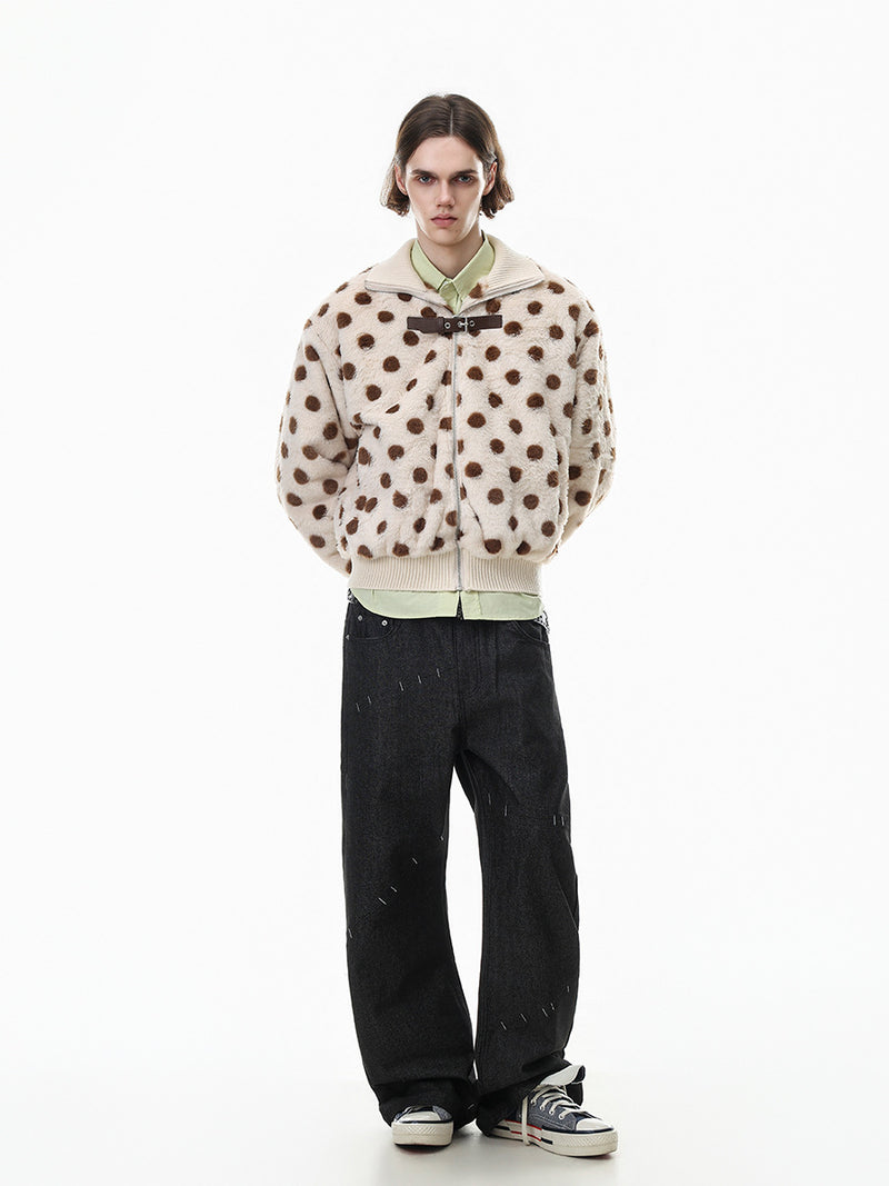 Full-body front view of a cream faux shearling bomber jacket with brown polka dots on a model