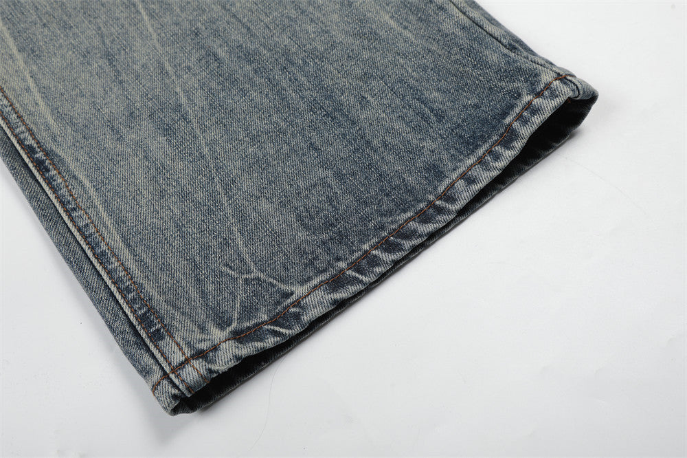 Vintage Washed Wide-Leg Flare Jeans – Distressed Faded Denim with Crease Detail