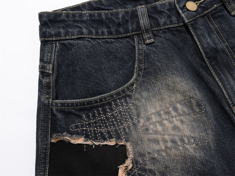 Distressed Patchwork Wide-Leg Jeans – Baggy Ripped Denim with Washed Finish