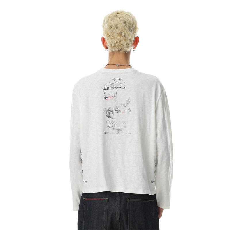 White long sleeve oversized tee with graphic print, back view on model