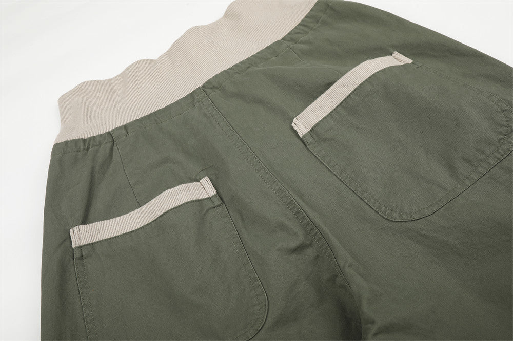 Pantalon palazzo à jambes larges – Taille haute, braguette à boutons, ceinture côtelée et ourlet brut