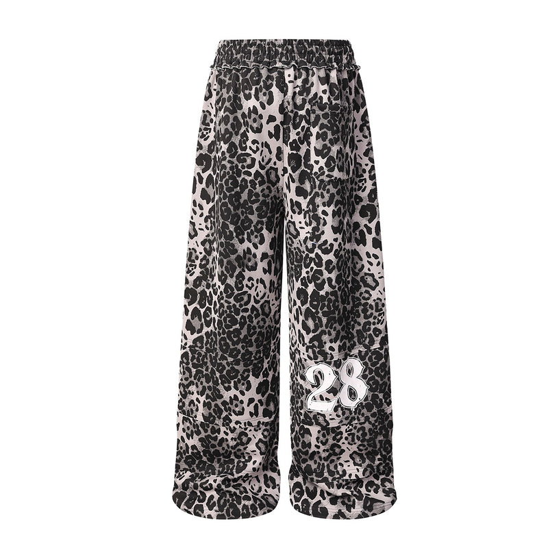 Pantalon de survêtement à jambes larges imprimé léopard avec motif tête de mort et numéro