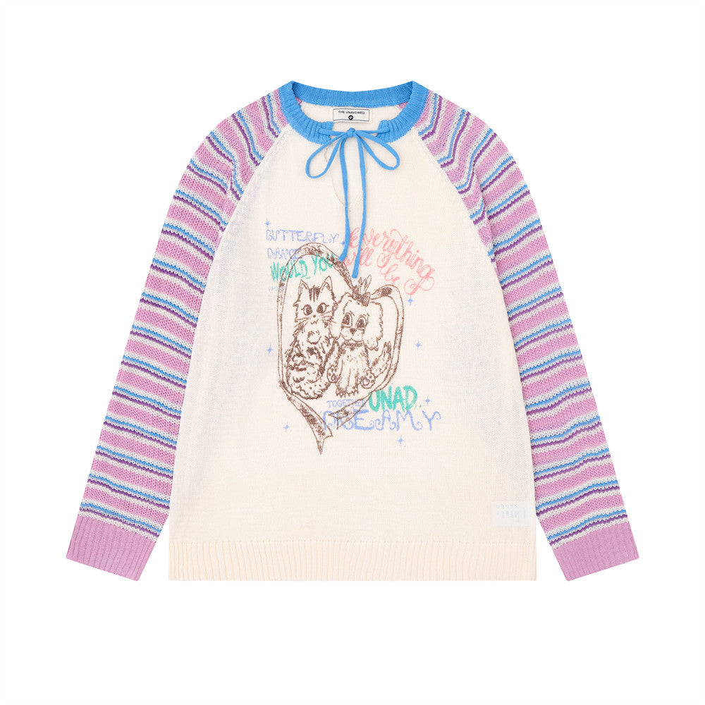 Pull en maille rayé colorblock à manches raglan avec col à lien