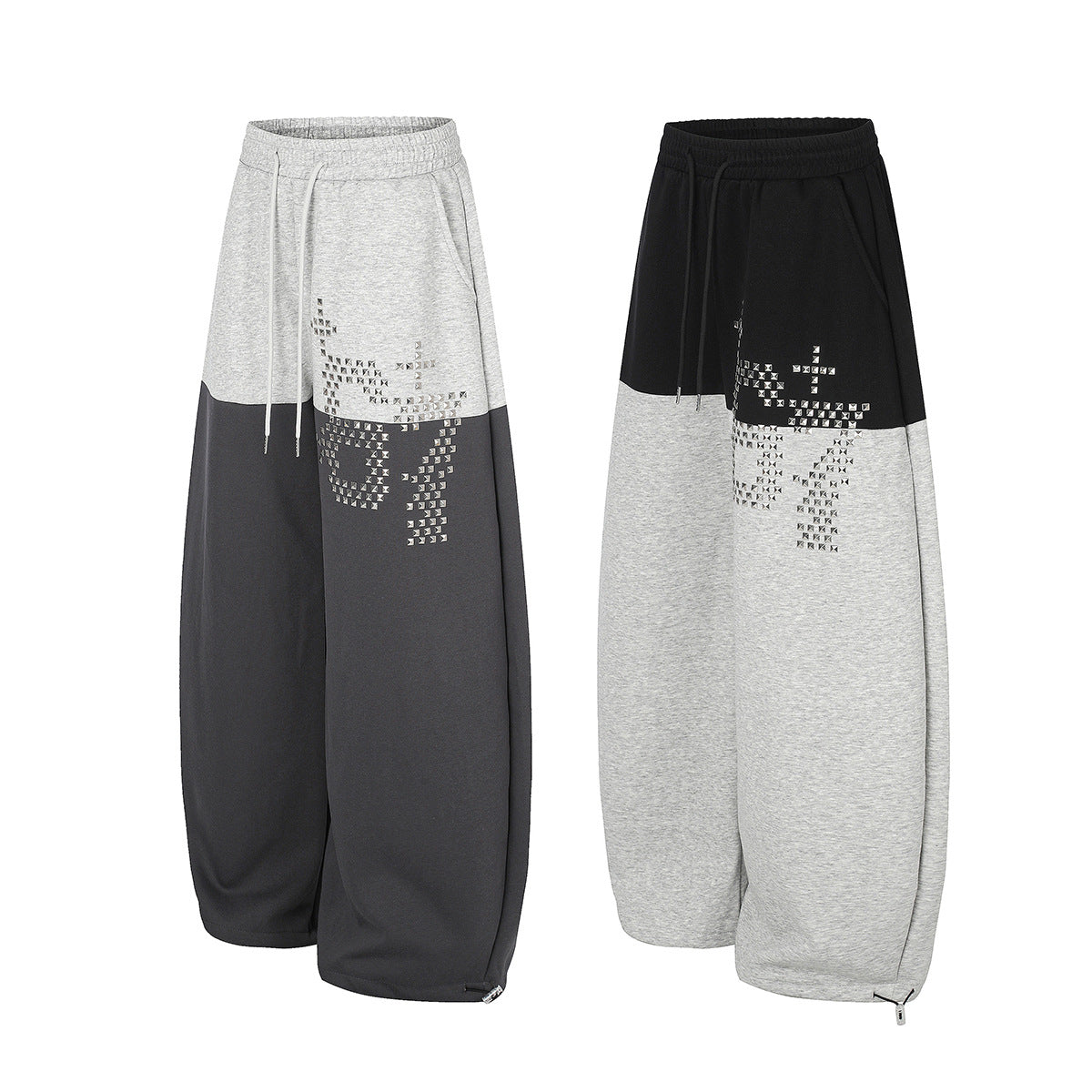 Gerade geschnittene Sweatpants – Colorblock-Baggy-Jogger mit Nieten-Grafik