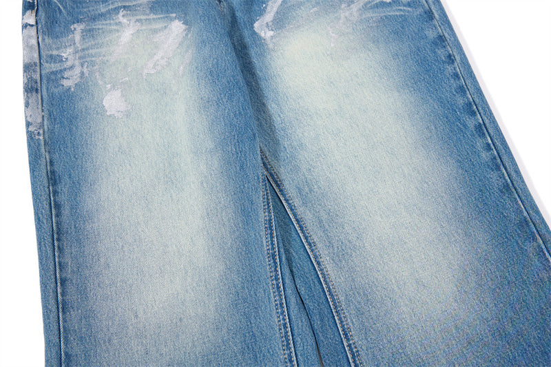 Distressed Flare Jeans – Men's Washed Blue Wide-Leg Denim with Paint Splatter