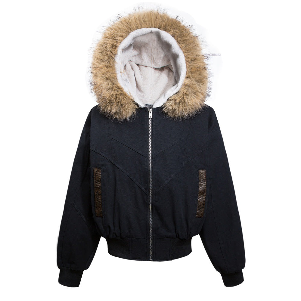 Oversized black hooded bomber jacket with raccoon fur trim and white fleece lining, front view