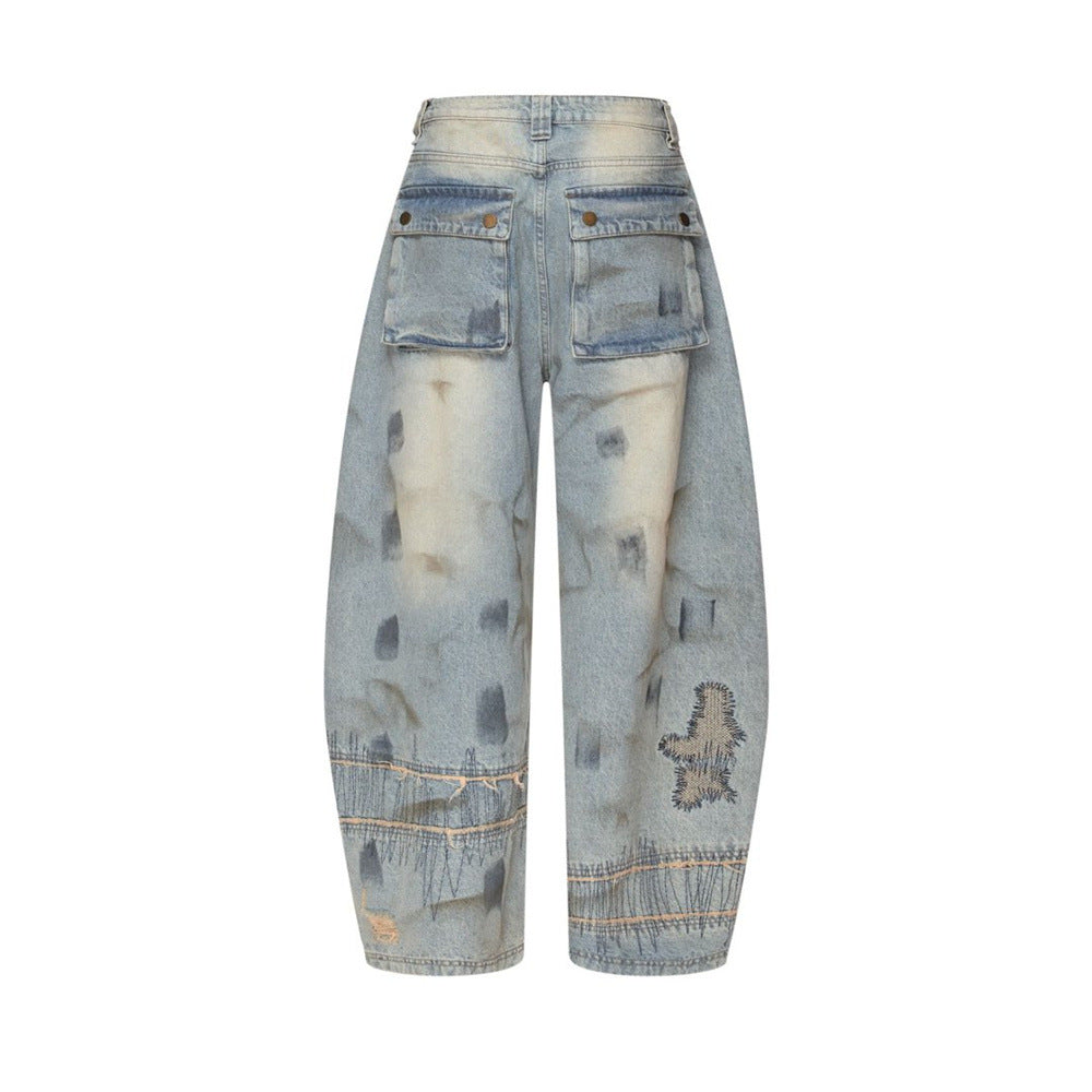 Men's Distressed Wide-Leg Jeans with Chaotic Embroidery & Metal Eyelet Detail